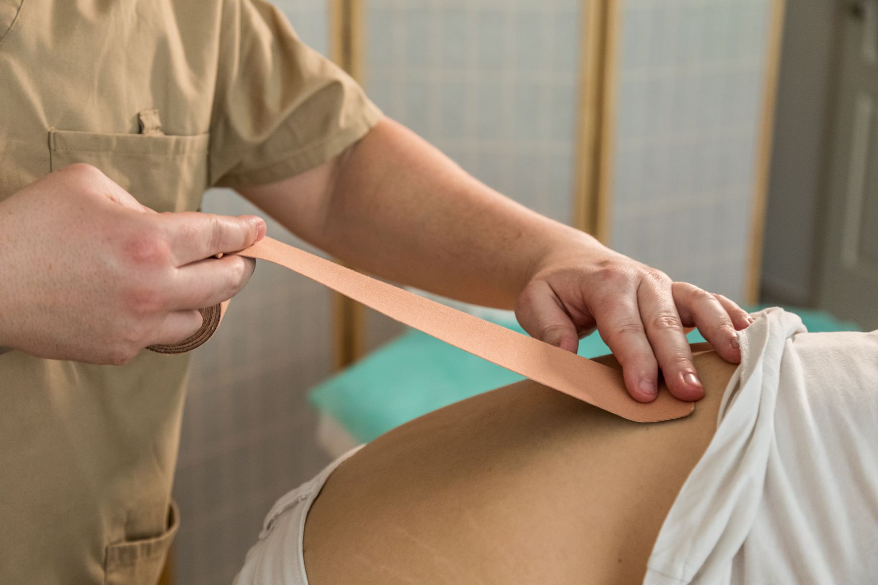 belső mosoly kezelés kinesio tape